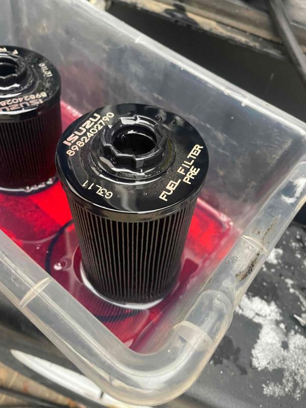 Fuel filters in fuel inside a bucket